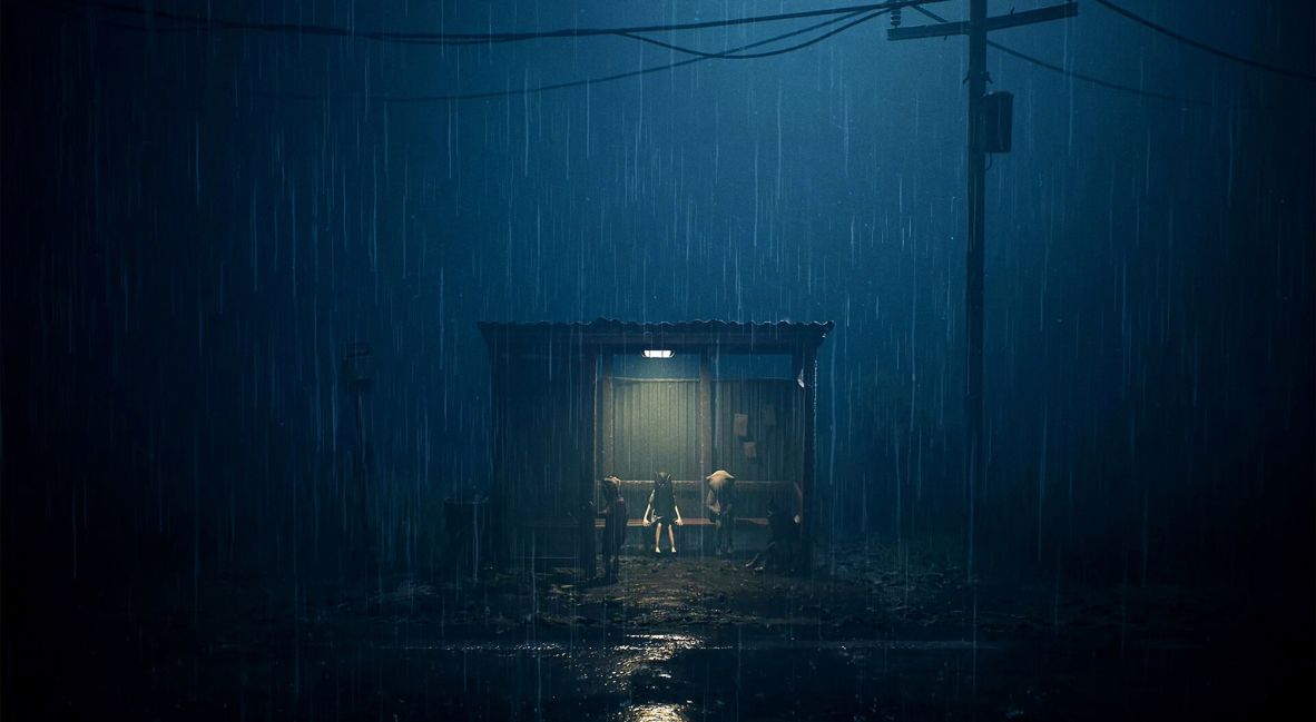 2 of the children taking refuge from the rain and darkness